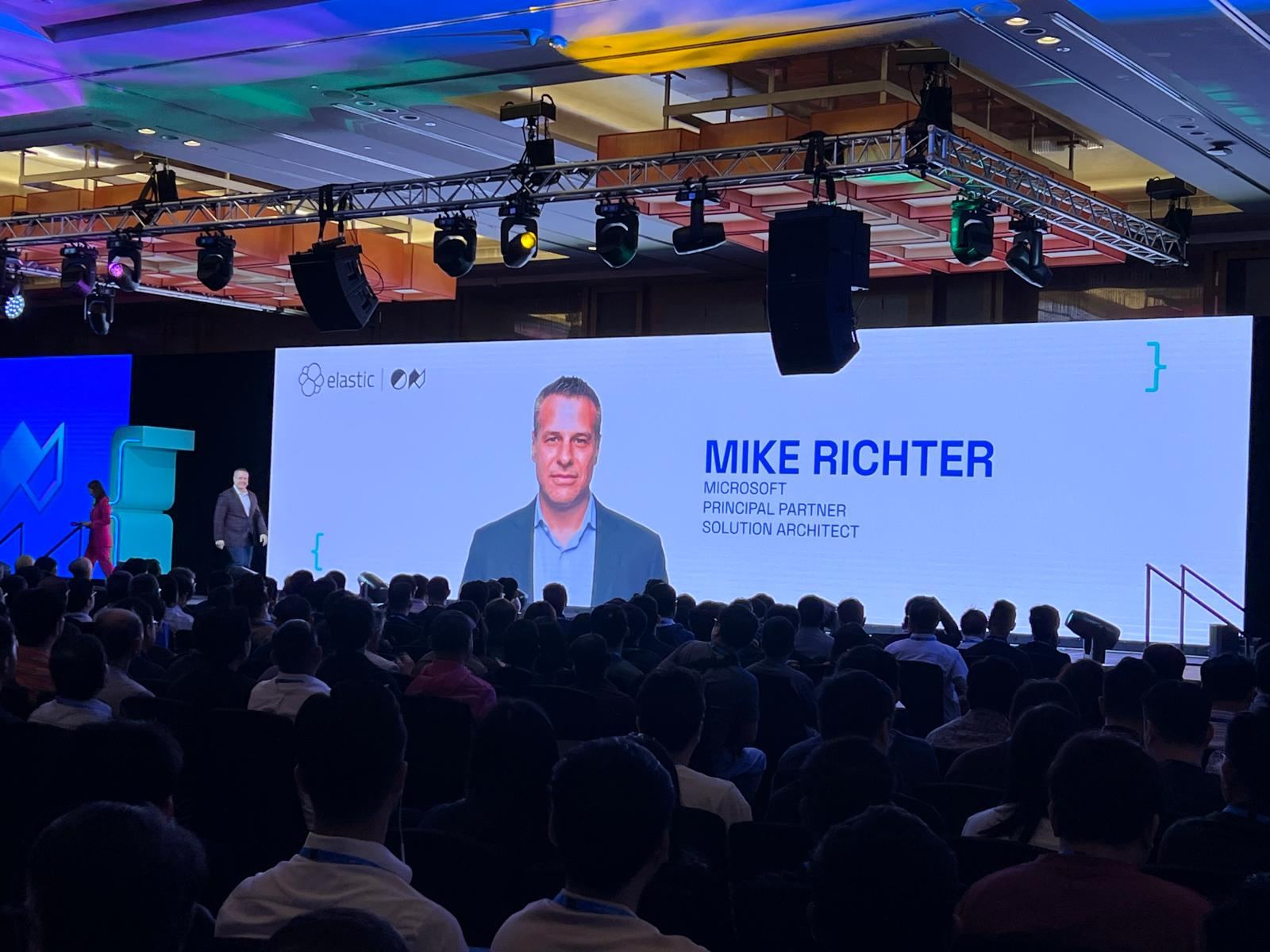 Mike Richter at the podium mid-keynote at ElasticON Singapore.